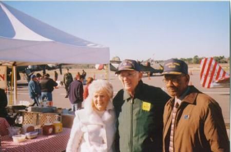 Thomas with wife Shirley and a Tuskegee Airman at air show in Ocala Florida in 2009